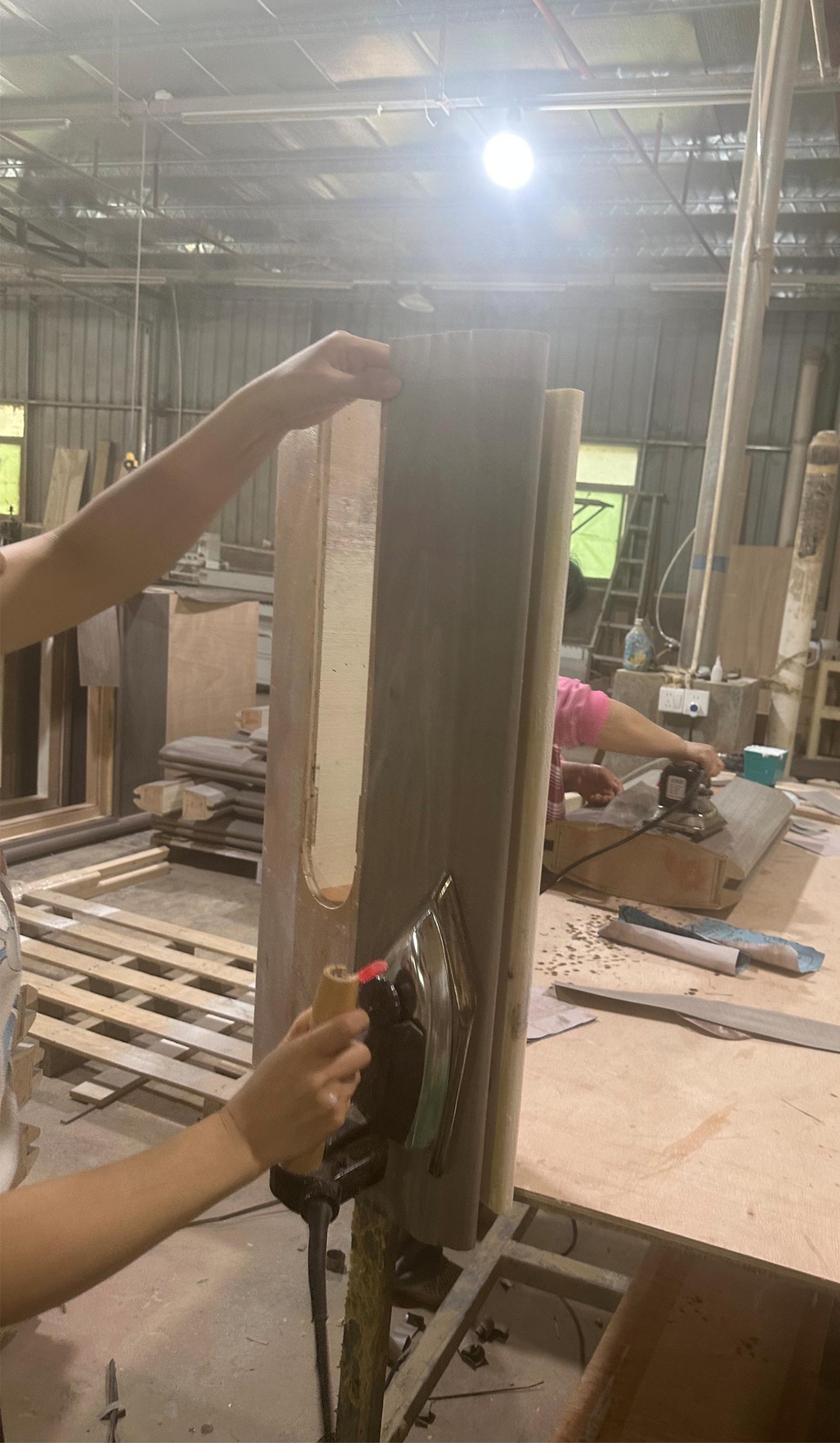 Laminating process — precision edge banding on custom millwork panel